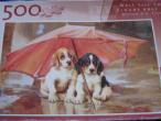 Daiktas puzzle 500d. šuniukai po skėčiu