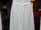 Daiktas žalsvai-baltai dryžuotas sijonas