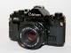 Daiktas Canon A-1 su objektyvu