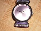 Daiktas violetinis moteriskas laikrodis