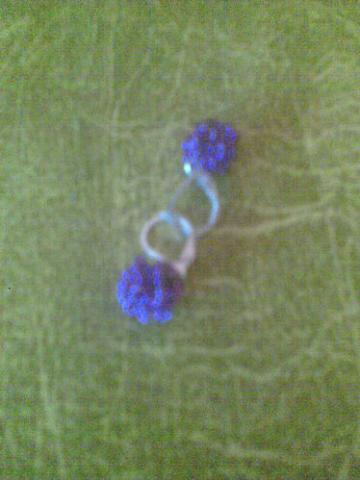 Daiktas Auskarai.Kurie atrodo lyg suglamžytas popierius;]