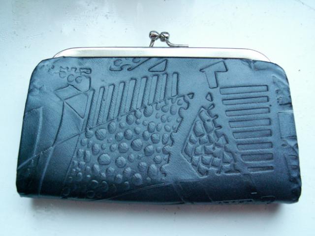 Daiktas orginali pinigine