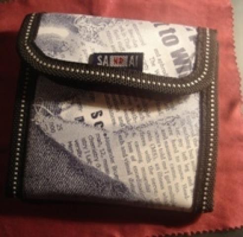 Daiktas ale 'laikraštinė' piniginė