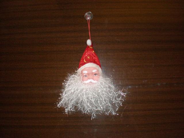 Daiktas Sventine pakabinama puosmena - zaisliukas kaledu senelio galva