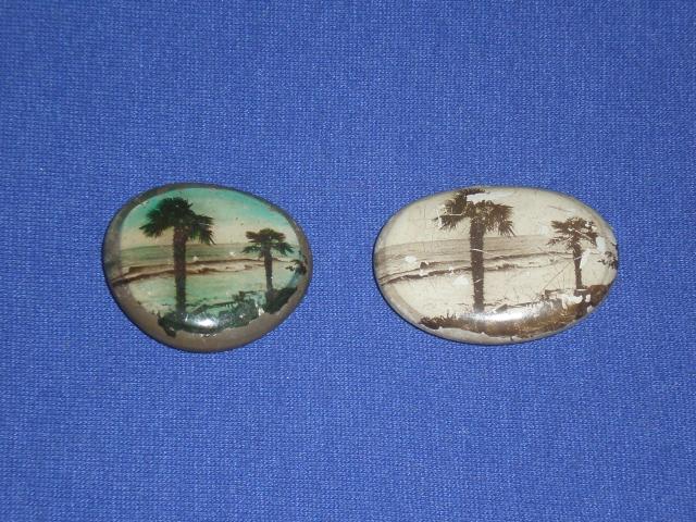 Daiktas 2 akmeneliai su ispiestomis palmemis