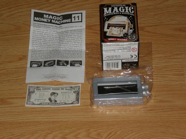 Daiktas Magiska ,,pinigu darymo'' masina (fokusams atlikti)