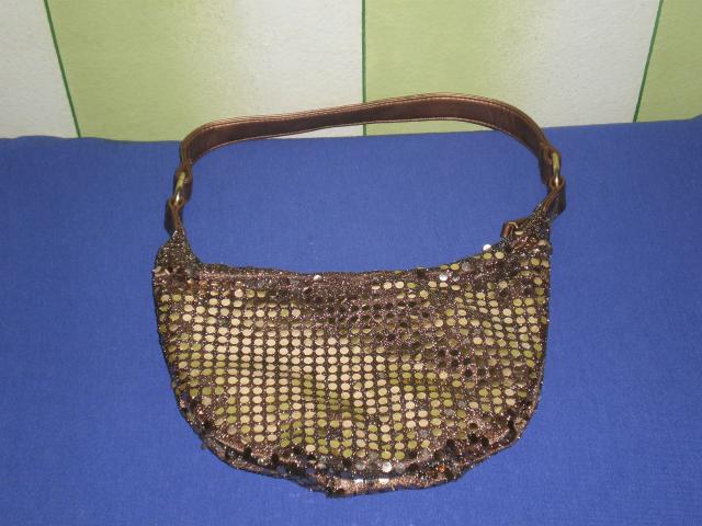 Daiktas Rankinukas rankine su blizguciais