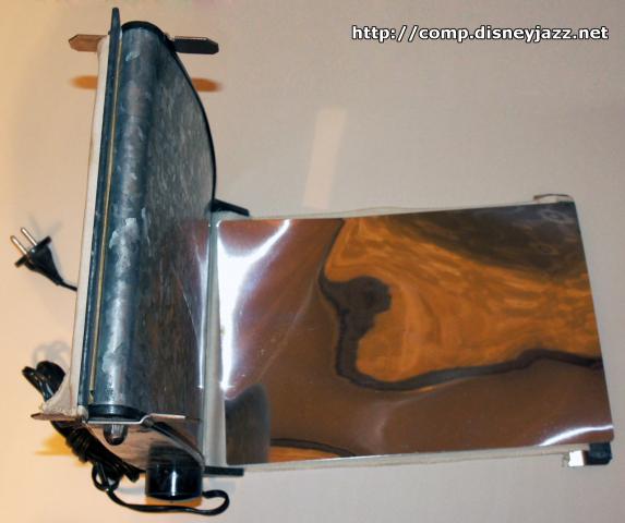 Daiktas aparatas dziovinti nuotraukas (fotoglencivatelis)