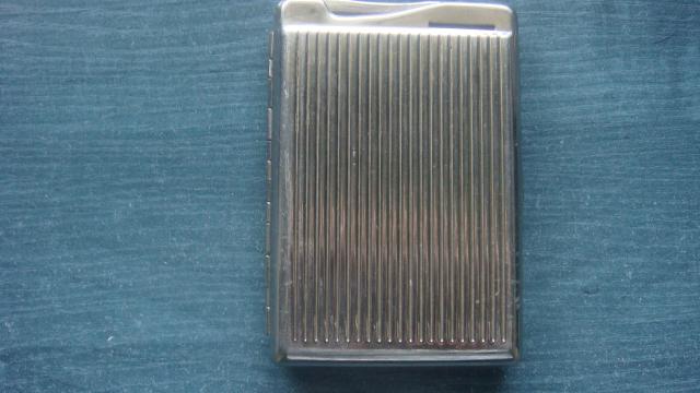 Daiktas Porcigaras + žiebtuvėlis.