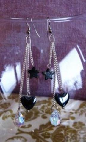 Daiktas ilgi gražūs auskarai