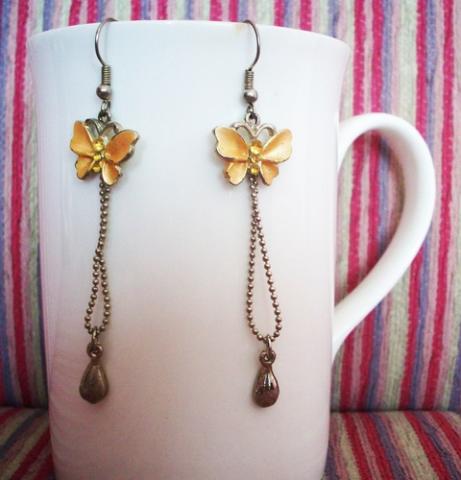 Daiktas Romantiški  drūgelio formos geltoni auskarai