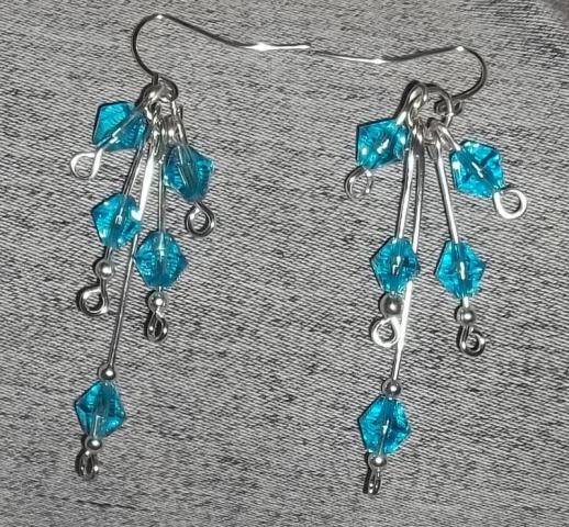 Daiktas ranku darbo auskariukas