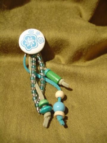 Daiktas Sege su karoliukais