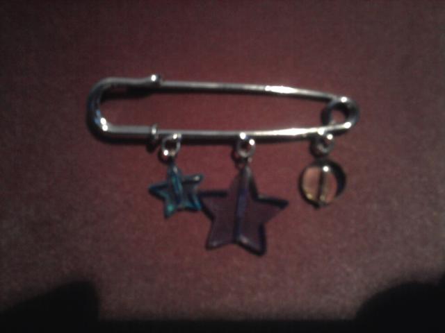 Daiktas Sage su plastikinem zvaigzdutem