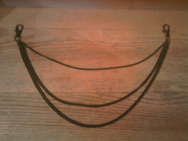 Daiktas Grandinele ant kelniu (didele)