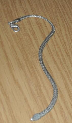 Daiktas Gelezine grandinele.