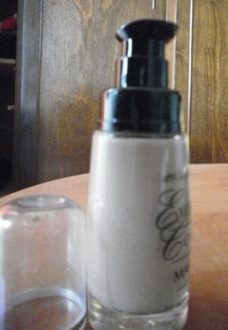 Daiktas geros firmos tanalinis kremas, tamsus