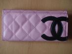 Daiktas Chanel pinigine