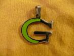 Daiktas pakabutis "G" raidė