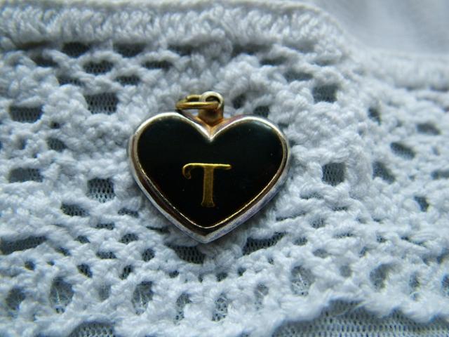 Daiktas Pakabukas raidė "T"