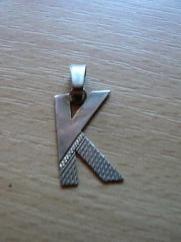 Daiktas pakabukai ant kaklo