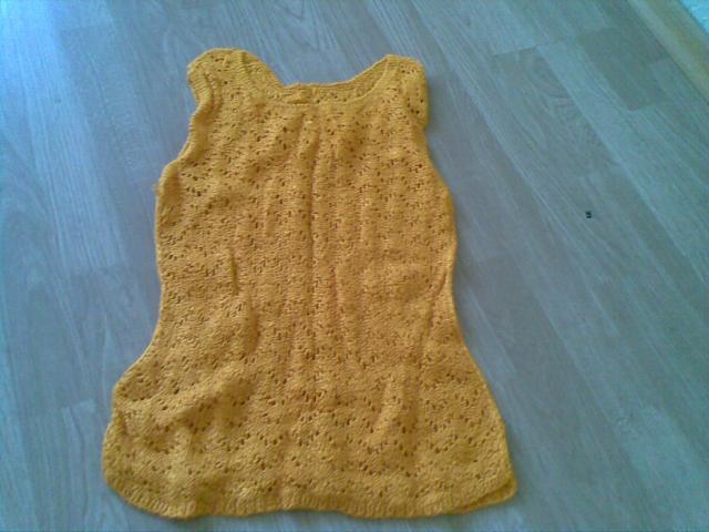 Daiktas ranku darbo megzta palaidine liemene