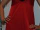Daiktas ilga raudona suknele