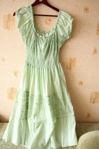 Daiktas nuostabi švelnios žalsvos spalvos suknelė