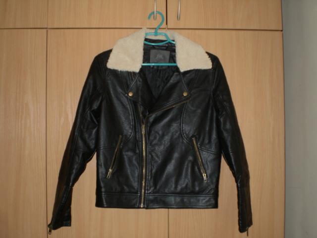 Daiktas juoda odinė koža