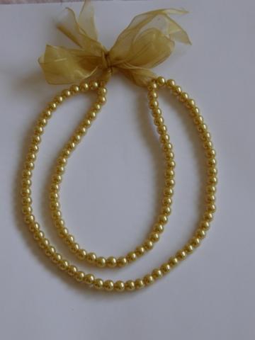 Daiktas karoliai geltoni