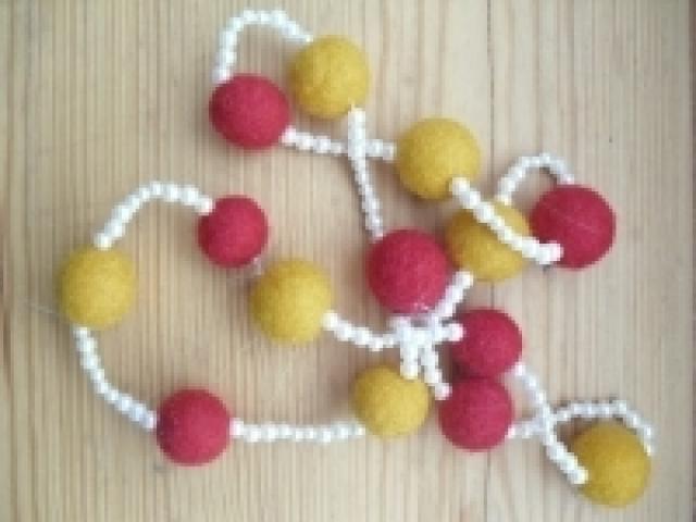 Daiktas Veltinio karoliai.