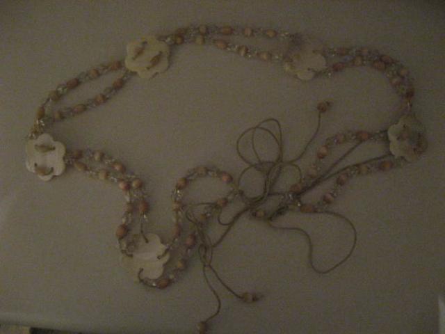 Daiktas diržas iš kriauklių