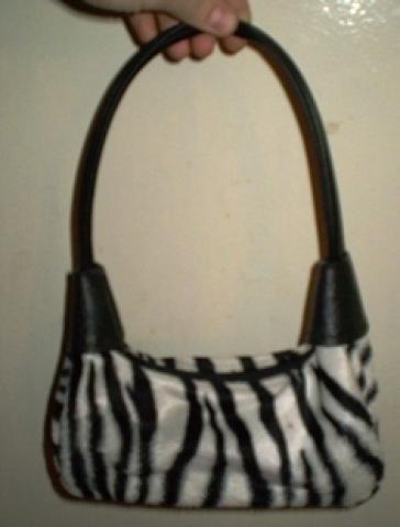Daiktas zebrinis rankinukas
