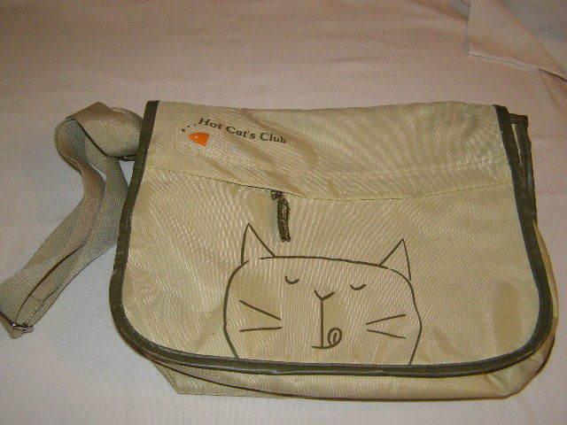 Daiktas Rankinė su kačiuku.