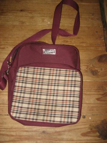 Daiktas Tašytė per petį