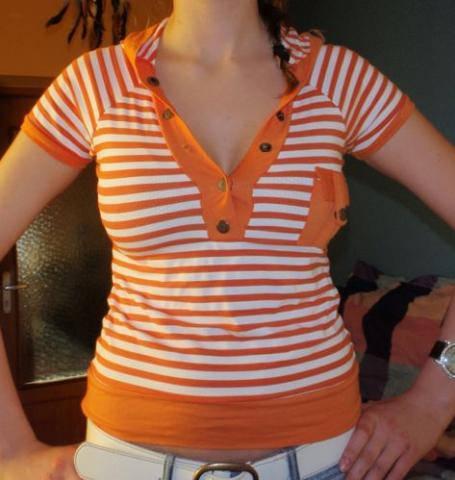 Daiktas oranzine su kapisonu