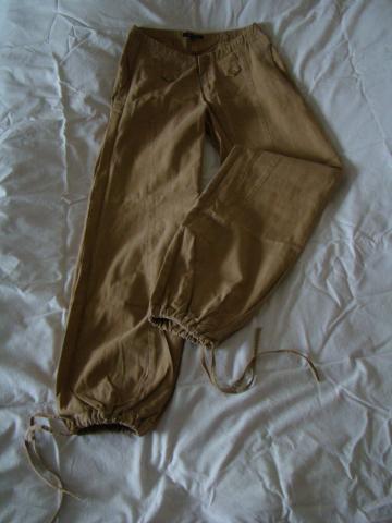 Daiktas Šviesiai rudos kelnės (38)