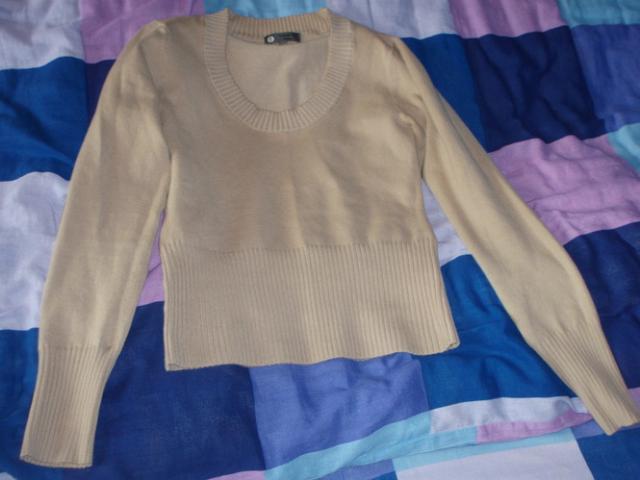 Daiktas smelio spalvos megztukas