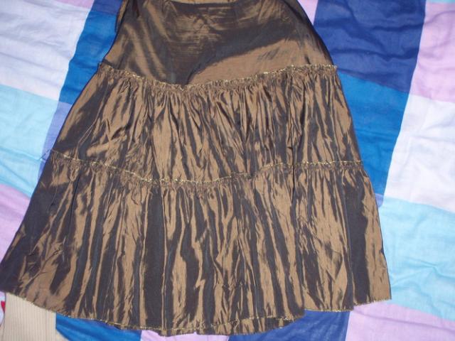 Daiktas puosnus blizdantis sijonas`