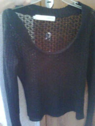 Daiktas Kiauraraštis megztinis