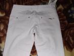 Daiktas baltos siaurjandzio kelnes