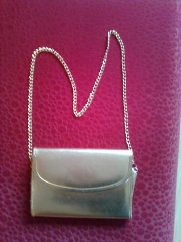 Daiktas Rankinė, gali būt kaip delninukė