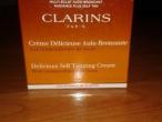 Daiktas Clarins delicious self tanning cream (savaimio idegio kremas veidui ir kunui)