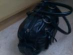 Daiktas juodas rankinukas :)