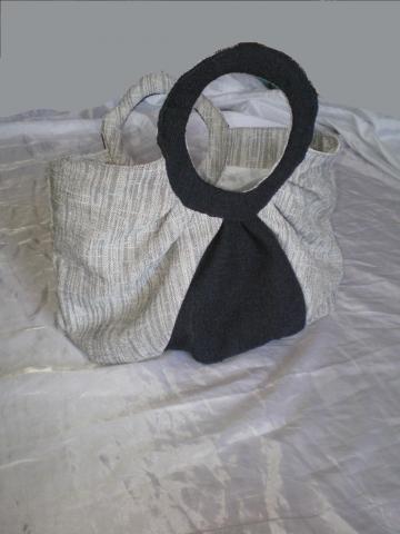 Daiktas Elegantiška rankų darbo rankinė