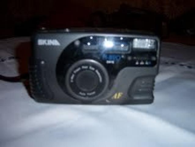 Daiktas fotoaparatas skina