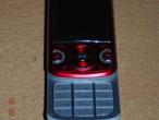 Daiktas Sony Ericsson W760i su viskuo