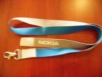 Daiktas Nokia telefono dirzelis ant kaklo