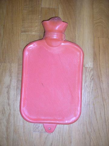 Daiktas Gumine sildykle, sildymo pusle su medziaginiu maisiuku